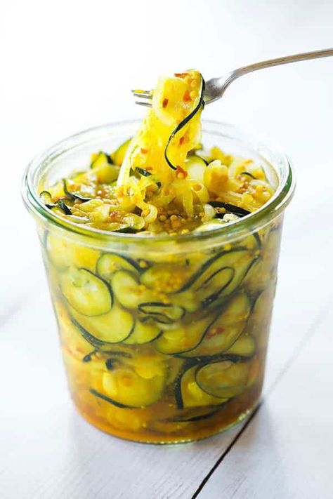 Sweet and Spicy Zucchini Refrigerator Pickles - A perfect recipe for using up your stash of zucchini! | browneyedbaker.com Spicy Zucchini, Parmesan Zucchini Chips, Refrigerator Pickle Recipes, Zucchini Pickles, Canning Equipment, Butter Pickles, Pickles Recipe, Crease Makeup, Summer Zucchini