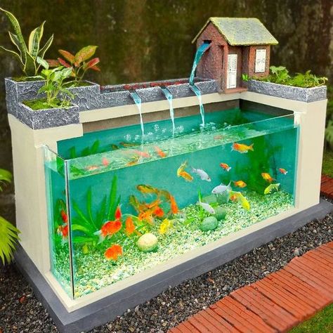 My Dad builds amazing waterfall aquarium for our empty garden Outdoor Fish Tank, Waterfall Decoration, Fish Ponds Backyard, Diy Ponds Backyard, Amazing Waterfall, Diy Waterfall, Fish Aquarium Decorations, Kolam Koi, Cool Fish Tanks