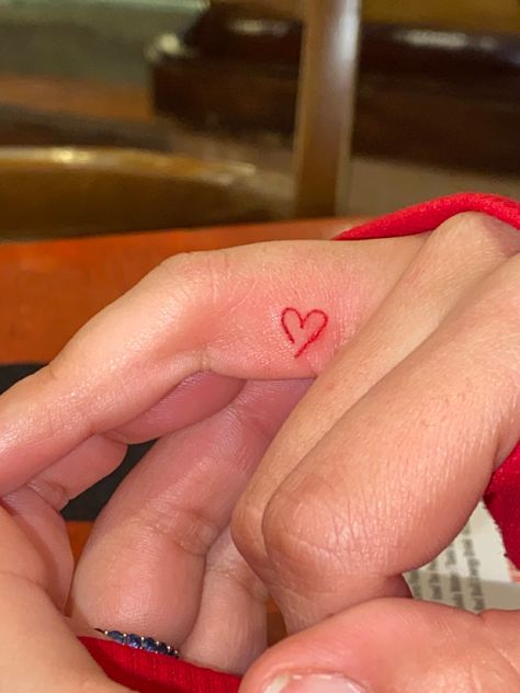 Cursive Heart Tattoo, Red Heart Hand Tattoo, Small Heart Tattoo On Hand, Heart On Hand Tattoo, Heart With Sparkles Tattoo, Heart Tattoo Red, Love Heart Tattoo Finger, Heart Tattoo Hand, Red Heart Finger Tattoo