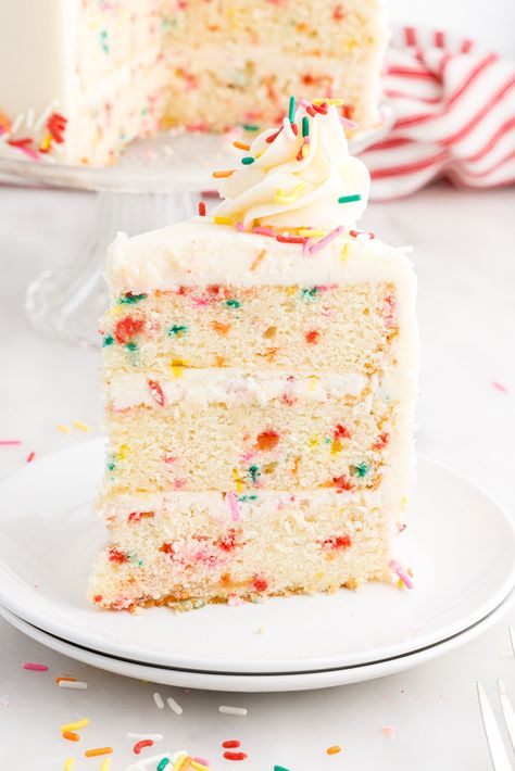 Classic buttery vanilla cake dotted with a rainbow of colorful sprinkles and made completely from scratch, this tiered funfetti cake is the epitome of the perfect celebration cake! Funfetti Cake From Scratch, Funfetti Layer Cake, Funfetti Cake Recipe, Confetti Cake Recipes, Classic Vanilla Cake, Cake Recipe From Scratch, Cake With Buttercream Frosting, Sprinkles Birthday Cake, Moist Vanilla Cake