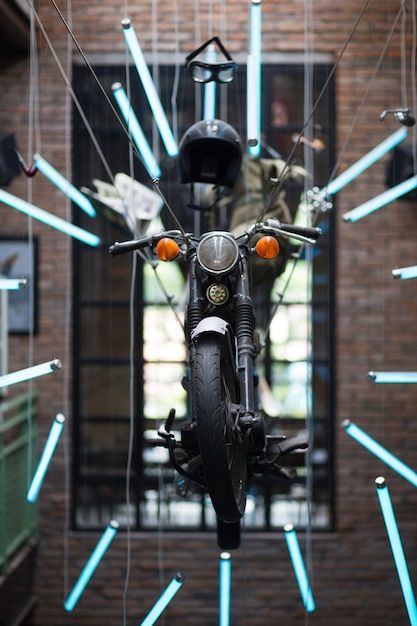 Motorcycle interior installation in pub | Free Photo #Freepik #freephoto #vintage #party #restaurant #blue Industrial Restaurant Design, Industrial Dance, Biker Photos, Party Restaurant, Motorcycle Events, Electric Bike Battery, Industrial Restaurant, Enduro Motorcycle, Budget Design