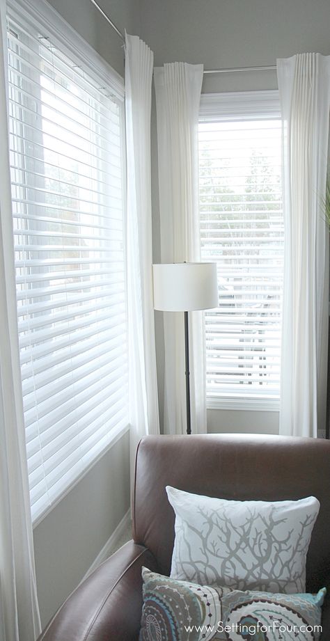 These are GORGEOUS! Beautiful window treatments with the CLASSIC look of shutters without the big price tag!!! How to install horizontal blinds. Kitchen Window Treatments With Blinds, Blinds For Small Windows, Family Room Window Treatments, Blinds And Curtains Together, White Faux Wood Blinds, Family Room Windows, White Blinds, Bedroom Blinds, Living Room Blinds