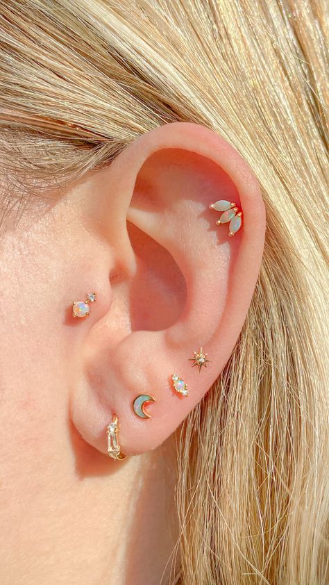 Shop our 14k solid gold piercing collection. Featuring genuine diamonds and real Australian opal. Adorn your ears with our fine jewellery. Opal Piercing Jewelry, Opal Ear Stack, Ear Piercings Aesthetic Gold, Opal Earring Stack, Opal Ear Curation, Opal Ear Piercings, Gold Ear Stack, Piercings Chart, Opal Piercing