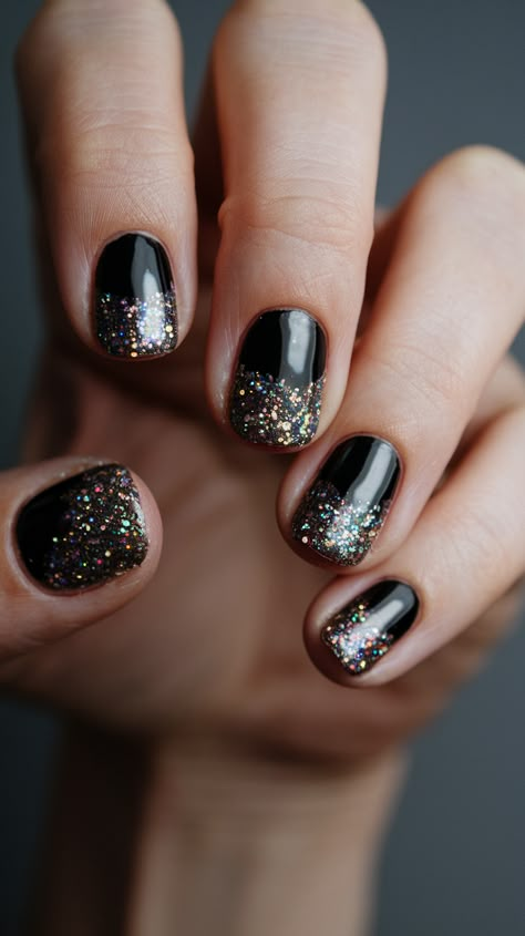 35 Stunning Black Nail Designs to Elevate Your Style Black Glitter Gradient Nails, Black Ombre Nails With Design, Dark Glitter Nails, Black Glittery Nails, Dark Nails With Glitter, Nails With Glitter Ombre, Sparkly Black Nails, Black Sparkly Nails, Black Sparkle Nails