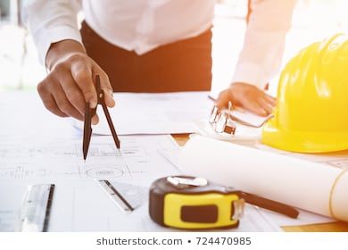 Architect or engineer working in office with blueprints,engineer inspection in workplace for architectural plan,sketching a construction project ,selective focus,Business construction concept.  photo Royalty free images stock Blueprint Construction, Civil Engineering Software, Construction Calculators, Construction Bids, Civil Engineering Projects, Building Information Modeling, Construction Business, Electrical Plan, Construction Plan