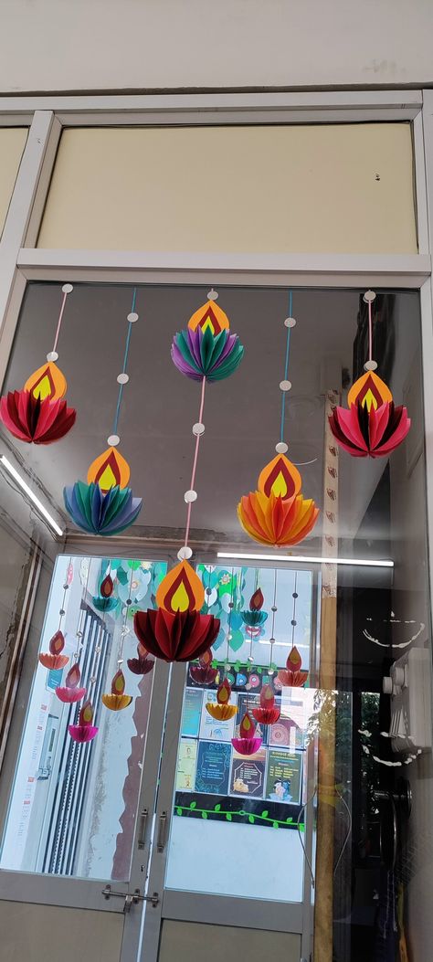 Diwali Decorations Office Diy, Ganpati Hanging Decoration, Classroom Diwali Decoration Ideas, Diy Diwali Toran Ideas, Vijayadasami Decorations In School, Diwali Decoration On Wall, Diwali Crafts With Paper, Diwali Bottle Decoration, Diwali Classroom Decoration Indian