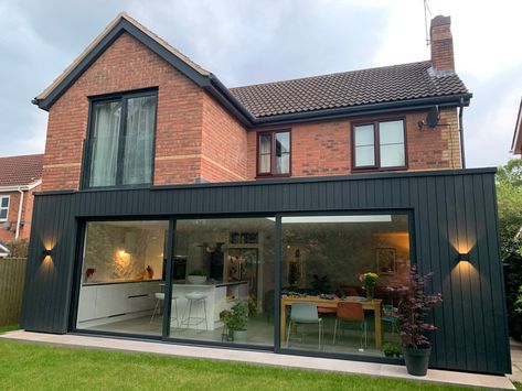 This rear extension to a detached property in Leicester creates a large open plan living kitchen to the rear of the property which opens onto the garden.  The ground floor is clad in black vertical timber with the master bedroom being extended above with a Juliet balcony looking over the garden. Side Extension Ideas, Rear Kitchen Extension, Rear Extension Ideas, Small House Extensions, Flat Roof Extension, Single Storey Extension, Extension Plans, Garden Room Extensions, House Extension Plans