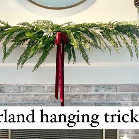 Kali on Instagram: "If you are feeling like you don’t have enough garland to achieve that “full” look on your mantle, try this trick: Instead of using command hooks and resting the garland on top of the mantle, try using cord bundles so you can drape the garland off the front of the mantle( giving it a much fuller look with less). Stick the command cord bundles at the edge of mantle and let the garland drape freely in front. It’s a great way to get a much fuller look without having to buy a ton of garland! Everything seen here is linked in my bio/stories including the command bundles I used to hang!" Garland On Mantle With Tv, Norfolk Pine Garland Mantle, Hanging Garland On Mantle, Mantle With Tv, Garland On Mantle, How To Hang Garland On Mantel, Garland Hanger, Hide Cords, Mantle Garland