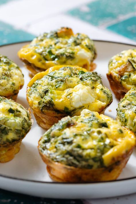 These Zucchini Egg Muffins are the perfect make ahead breakfast and they're freezer-friendly! They're made with sauteed zucchini, feta cheese, and lots of fresh herbs. The prep is super easy and you can serve them for breakfast or as a snack on-the-go. They're delicious both hot and cold, healthy, quick, and easy! Zucchini Feta Muffins, Zucchini Egg Bites, Zucchini Egg Muffins, Egg Zucchini, Pesto Tortellini Salad, Zucchini Egg, Sausage And Veggies, Breakfast Egg Muffins, Veggie Muffins