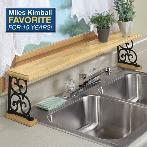 Repupose Over The Sink Shelf  ~ Hang upside down over the kitchen window to use as a plant shelf Over The Sink Shelf, Counter Ideas, Organiser Cucina, Model Dapur, Kitchen Ikea, Sink Shelf, Kabinet Dapur, Diy Kitchen Decor, Tiny Kitchen