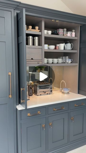 Thomas James Kitchens on Instagram: "This larder cupboard was designed to be a dedicated breakfast station for our client in Hale. The bespoke shelving, bread bin and pull out chopping board are all designed to house the family’s morning essentials. A Quooker hot tap has been installed here too, for the ultimate convenience when making the morning brews ☕️  Would a breakfast station be on your dream kitchen wish list?  #kitchendesign #luxurykitchen #kitchendesignideas" Breakfast Cupboard Kitchen Cabinets, Kitchen Breakfast Cupboard, Bespoke Kitchen Ideas, Breakfast Bar Cupboard, Kitchen Breakfast Station, Breakfast Kitchen Station, Pull Out Larder Cupboard, Kitchen Larder Cupboard Ideas, Breakfast Station Kitchen