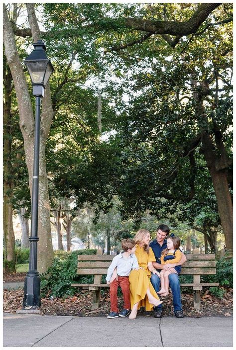 Family sitting on a park bench in Forsyth Park in Savannah, Georgia. Family photos in downtown Savannah Georgia. Photographed by Kristen M. Brown, Samba to the Sea Photography.    #savannah #savannahgeorgia #familyphotography Family Poses Sitting On Bench, Park Bench Family Photo, Savannah Family Photos, Bench Photography Poses Family, Family Photo Downtown, Fall Family Photos In The City, Family On Bench Photo, Family Photos On Bench, Family Photo Poses On Bench