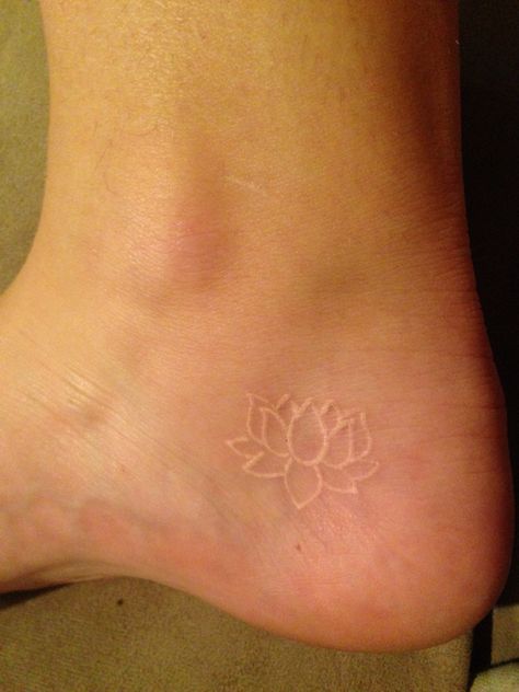 Small white ink lotus tattoo, 3 weeks Tiny Lotus Tattoo, Simple Lotus Flower Tattoo, Simple Lotus Tattoo, Lotusblume Tattoo, Small Lotus Tattoo, Cute Ankle Tattoos, Tattoos 2024, Tattoo Lotus, Ankle Tattoo Designs