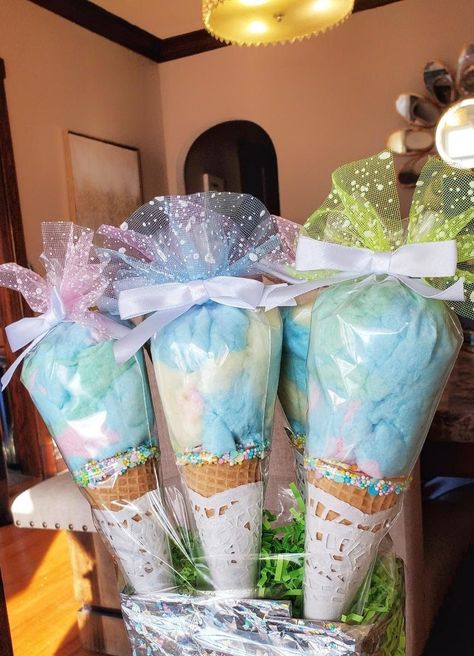 A truly delightful gift for the kiddos, a delicious combination of cotton candy and Ice Cream Cones Great gift idea to send your loved ones! 10 Ice Cream Cones with Cotton candies Ice Cream Cones covered with white doilies and sprinkles. Colorful Cotton Candy Tied with bows and Pastel mesh. All candies are factory made. ** candies may be substituted depending on availability ** Will ship via USPS Priority mail. Please inform me of the date these treats are needed by so I can create them and ship Cotton Candy Bouquet, Cotton Candy Favors, Cotton Candy Cone, Sweet Cart, Ice Cream Waffle Cone, Candy Kabobs, Sweet Carts, Candy Birthday Party, All Candy