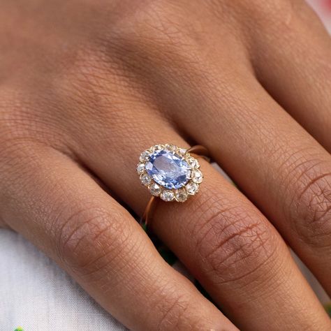 Antique Jewelry Victorian Rings, 3 Stone Sapphire Engagement Ring, Saphire Engament Ring Set Light Blue, Blue Diamond Gold Ring, Indy Blue Wedding Ring, Oval Diamond With Sapphire Side Stones, Light Blue Stone Engagement Ring, Pale Blue Engagement Ring, Vintage Blue Engagement Rings