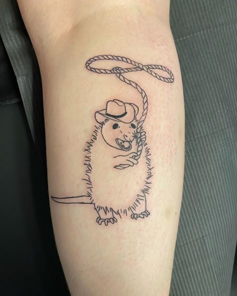 Yippee Ki-yay #cowboy #cowgirl #lasso #opossum #opossumtattoo #orlandoflorida #orlandotattooartist #collegeparkfl #ignoranttattoo #ignorant_tattoos #ignorantstyletattoo #orlandotattoos #derptattoo Cute Southern Tattoos, Tattoos For Weirdos, Rat Cowboy Tattoo, Funny Animal Tattoos Simple, Funny Cowboy Tattoo, Cowboy Lasso Tattoo, Spooky Neck Tattoo, Unhinged Tattoo, Cowboy Animal Tattoo