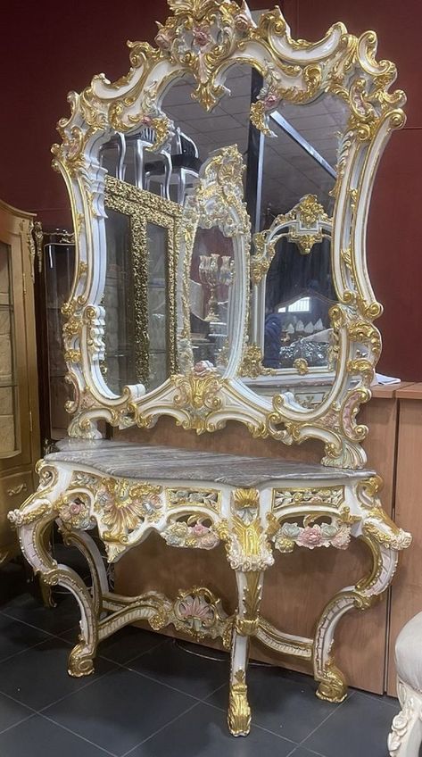 This baroque style mirror console by Casa Padrino looks very elegant and classy in every bedroom! Magnificent baroque mirror console by Casa Padrino   Material: solid wood, polyresin, marble, mirror glass Width approx.: 170 cm Height approx.: 245 cm Color: white / multicolor / gold / gray Handmade Looks very elegant and classy From the baroque furniture collection by Casa Padrino!   This item is authentic handcrafted antique style replica. Color variations, small cracks, color flaking, antique marks, bumps and other antique style features are part of the article and make each piece of furniture unique.   You are purchasing a product of the brand Casa Padrino. Casa Padrino is a Europe-wide renowned producer and distributor of baroque furniture and a registered trademark with the German Pate Console With Mirror, Baroque Chair, Antique Gold Mirror, Marble Mirror, Royal Room, Royal Decorations, Rococo Furniture, Baroque Mirror, Baroque Furniture