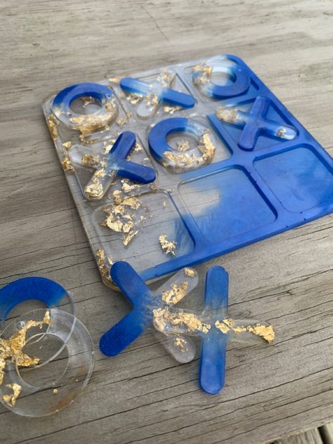 Epoxy resin tic tac toe board blue and gold-leaf Candle Art Drawing, Resin Tic Tac Toe, Tic Tac Toe Diy, Tic Tac Toe Board, Fun Drinking Games, Resin Crafts Tutorial, Diy Resin Projects, Candle Art, Diy Resin Art