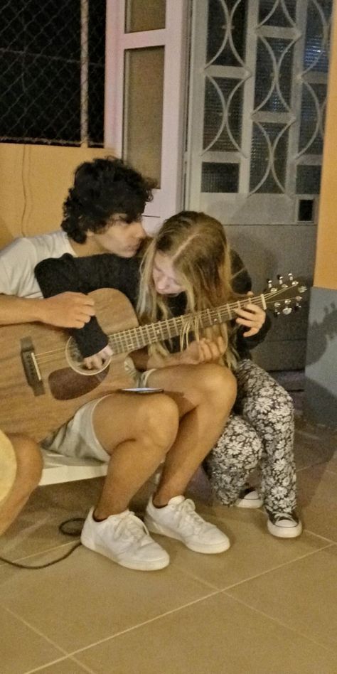 me and my bf playing guitar Teaching Guitar Couple, Boyfriend Singing To Girlfriend, Couple Guitar Aesthetic, Two People Playing Guitar, Guy Playing Guitar Aesthetic, Guitar Couple Aesthetic, Guitar Boyfriend Aesthetic, Musician Boyfriend Aesthetic, Bethany Aesthetic