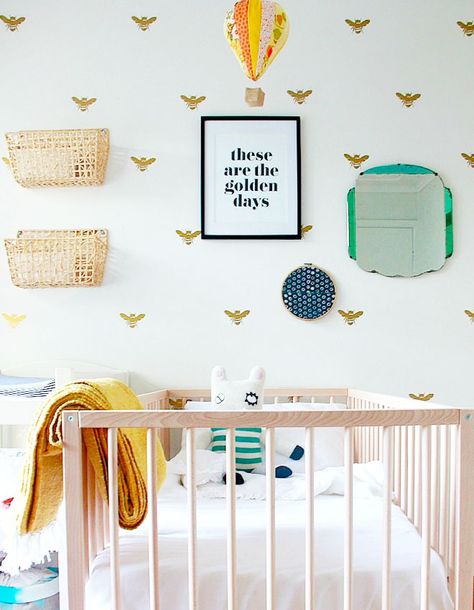 62 nursery theme ideas: A to Z guide | Mum's Grapevine Honey Bee Wallpaper, Outdoors Themed Nursery, Giraffe Nursery Theme, Nautical Theme Nursery, Gender Neutral Nursery Design, Bee Wallpaper, Nursery Design Neutral, Bee Nursery, Jungle Theme Nursery