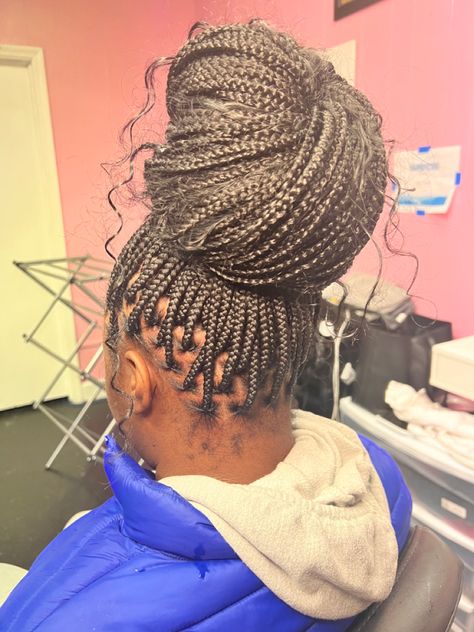 Knotless Braids In A Low Bun, Knotless Bun With Curls, Bohemian Knotless Braids In A Bun, Small Knotted Braids, Small Bohemian Knotless Braids Styles, Xs Knotless Braids Hairstyles, Boho Knotless Braids In A Bun, Bohemian Knotless Braids Bun, Small Knotless Braids With Curly Ends And Color