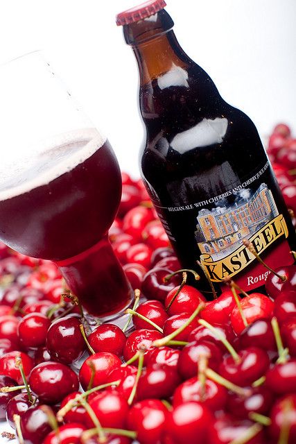 Kasteel Rouge is aptly named for it’s deep, dark red color brought on by the addition of sour cherries to a base of brown ale, which is then left in the barrel for a six month period. This ale will surprise many with the sour of the cherries and the 8% alcohol level. Great with a BBQ, to accompany a dessert or simply as an outstanding real ale. Spicy Ribs, Cherry Beer, Belgian Ale, Fruit Beer, Sour Cherries, Sour Beer, Beers Of The World, Belgian Beer, Brown Ale