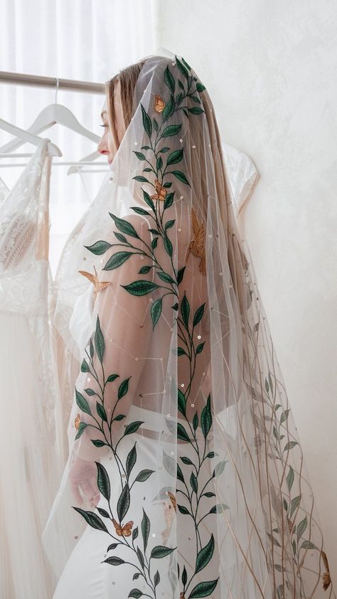 Rue De Seine Wedding Dresses | AN ICON 🕊 The details of our Mountain Song veil are unmatched. Embroidered leaves creep up the sides with intricately stitched birds… | Instagram Embroidered Vines Wedding Dress, Rue De Seine Mountain Song Veil, Wedding Dresses With Leaves, Veil With Leaves, Flower Embroidered Wedding Veil, Bird Wedding Dress, Mexican Wedding Veil, Colorful Veil Wedding, Mexican Veil