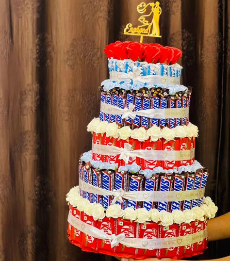 Chocolate tower🎀✨ Engagement series (4/8) #enagagement #trending #chocolatehampers #kitkattower #glimpsofus Chocolate Tower Hamper, Engagement Hamper, Bucket Balon, Chocolate Tower, Ceremony Outfit, Haldi Ceremony Outfit, Chocolate Hampers, Views Video, Haldi Ceremony