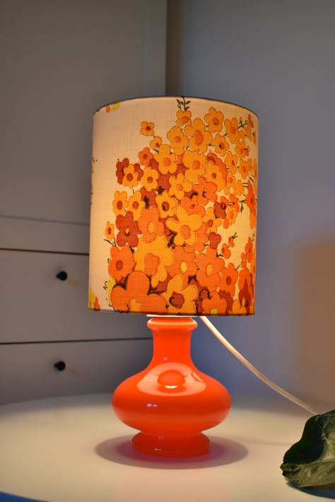 Amazing vintage table lamp, made in the 70s. This beauty is made of cased glass base and lampshade is made of fabric. The lamp is really something special, as both the lampshade and the base can be lit. It gives off fabulous light when lit and it is a real eye catcher and a great decor. 1970s Table Lamp, Orange Bedside Lamp, Retro Lamp Shade, 70s Hanging Lamp, 70s Home Decor Bedroom, Funky Desk Lamp, Retro Lamps Vintage, 70s Lamps, 1970s Lamp