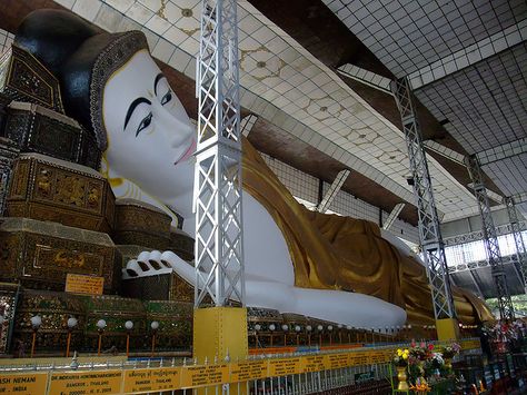 The Shwethalyaung Buddha is a reclining Buddha in the west side of Bago , Burma . The Buddha, which has a length of 55 m (180 ft) and a height of 16 m (52 ft), is the second largest Buddha in the world, after the 74 m reclining Buddha in Dawei (Tavoy). The Buddha is believed to have been built in 994, during the reign of Mon King Migadepa. It was lost in 1757 when Pegu was pillaged. During British colonial rule, in 1880, the Shwethalyaung Buddha was rediscovered under a cover of jungle growth. Bago City, Myanmar Country, Reclining Buddha, Burma Myanmar, The Buddha, Southeast Asian, West Side, Country Art, Bago