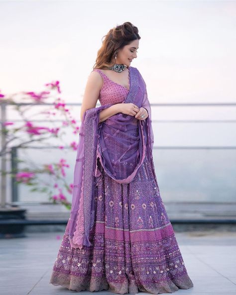 @nargisfakhri looks enchanting in ‘Ayat’ - our handcrafted lehenga in a mesmerising lilac palette. To find the perfect ensemble for… Lilac Palette, Lilac Lehenga, Purple Lehenga, Floral Lehenga, Lehnga Dress, Punjabi Outfits, Indian Photoshoot, Indian Dresses Traditional, Party Wear Indian Dresses