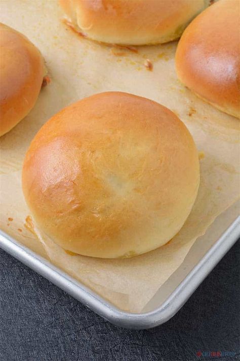 Freshly baked bread bun on a tray Hamburger Stuffed Buns, Filled Buns Savory, Stuffed Brioche Buns, Meat Buns Recipe Ground Beef, Beef Buns Recipe, Meat Stuffed Buns, Stuffed Buns Recipe Meat, Meat Stuffed Bread Rolls, Meat Filled Buns