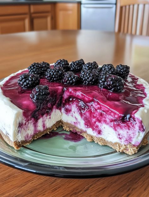 Blackberry Cheesecake 🫐 

🫐 𝗜𝗻𝗴𝗿𝗲𝗱𝗶𝗲𝗻𝘁𝘀 🫐
For the Crust:
1 ½ cups graham cracker crumbs 🍪
1/3 cup unsalted butter, melted 🧈
1/4 cup granulated sugar 🍬
For the Cheesecake Filling:
1 ¼ cups heavy cream 🥛
2 teaspoons gelatin powder 🍮
1/4 cup cold water 💧
2 (8 oz) packages cream cheese, room temperature 🧀
2/3 cup granulated sugar 🍬
2 teaspoons vanilla extract 🌱 Red Velvet Cheesecake Brownies, Gelatin Powder, Cheesecake Ingredients, Rocky Road Ice Cream, Showstopper Cakes, Blackberry Cheesecake, Cheesecake Squares, Banana Pudding Cheesecake, Caramel Tart