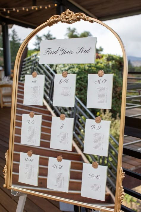 Wedding Seat Chart Alphabetical, Guest Table Assignments Ideas, Mirror Guest List Wedding, Mirror Alphabetical Seating Chart, Reception Seating Chart Mirror, Mirror Table Seating Chart Alphabetical, Creative Seating Chart Wedding Party Favors, Wedding Guest List Mirror, Wedding Guest Seating Chart Display Diy