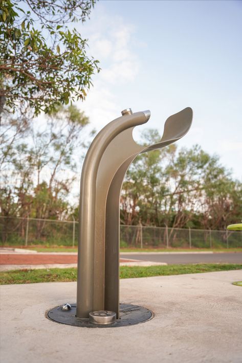 Timeless and sculptural fountain that supplies water for drinking and refilling containers. Pets can rehydrate via the bubbler at the base of the fountain. Arqua Fountain adheres to DDA, is wheelchair-friendly and is certified under the WaterMark standard WMTS105:2016. Please note it is best not to install the dog bubbler near sand, which may interfere with button activation. Drinking Water Fountain, Dog Water Fountain, Drinking Fountains, Wheelchair Friendly, Drinking Fountain, Rainwater Harvesting, Fountains Outdoor, Street Furniture, The Fountain