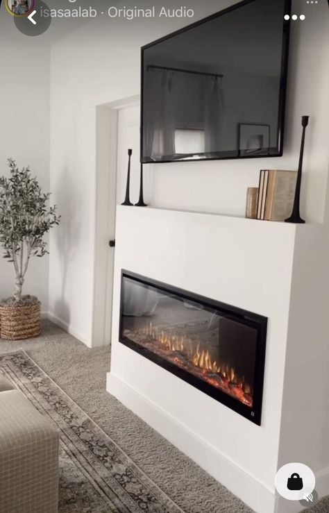 Master Bedrooms Electric Fireplace, Electric Fireplace With Ledge, Tv And Fire Wall Ideas Bedroom, Small Bedroom With Electric Fireplace, Bedroom Electric Fireplace Ideas With Tv, Corner Electric Fireplace Modern, Minimal Electric Fireplace, 77 Inch Tv Living Room, Minimalist Fireplace With Tv