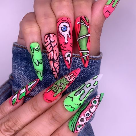 Mars Attacks Nails, Zombie Nails Acrylic, Blooming Gel Halloween Nail Art, Halloween Beach Nails, Werewolf Nail Art, Halloween Pop Art Nails, Gory Nail Designs, Hocus Pocus Nails Design, Rob Zombie Nails