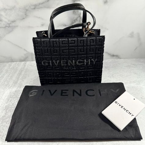 This bag is the smallest member of Givenchy's 'G Tote' family. Sized down to a mini version, it's made from canvas jacquard with a tonal '4G' design and the brand's logo embroidered across the front. It has leather trims and a detachable strap for days when you want to carry it hands-free. 👜 Logo Embroidered, Hands Free, Logo Branding, Leather Trims, Givenchy, Carry On, ? Logo, Canvas, Leather