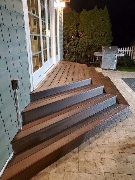 Trek Deck Steps, Stairs To Deck Ideas, Wood Stairs On Concrete Patio, Concrete Patio With Stairs From House, Back Patio Stairs Ideas, Corner Patio Steps, 3 Sided Stairs, Small Deck Steps With Landing, Steps To Backyard Patio