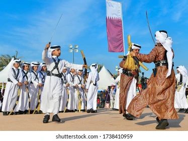 NOVEMBER 10,2017-DOHA,QATAR:Qatari boys perform performing traditional dances during Qatar Museum of Islamic Art Community Day Event at Museum of Islamic Art park in Doha Qatar Museum, Qatar National Day, Museum Of Islamic Art, Art Park, City Lifestyle, Traditional Dance, Doha Qatar, Folk Dance, Future City