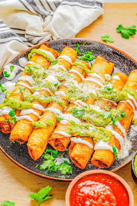 Chicken Taquitos - 🌮🧀🥑 Learn how to make the BEST tasting taquitos at home that rival a Mexican restaurant in just 30 minutes with a handful of common ingredients! Crispy and crunchy on the outside, warm melted cheese and seasoned chicken on the inside, these will be a hit at your next fiesta or casual get-together! Instructions provided to bake, air fry, or fry so you're set to make this EASY recipe! Sour Cream Uses, Fish Pasta, Chicken Taco Salad, Taquitos Recipe, Averie Cooks, Chicken Taquitos, Seasoned Chicken, Burritos Recipe, Easy Cheesy