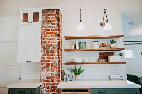 Check out this elegant kitchen space with exposed red brick chimney on HGTV.com. Column In Kitchen, Exposed Red Brick, Exposed Brick Kitchen, Kitchen Dining Room Combo, Kitchen Chimney, Brick Columns, White Tile Backsplash, Brick Chimney, Brick Kitchen