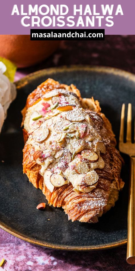 This fusion of a classic Indian dessert, almond halwa, with French bakery-style almond croissants is perfect for brunch. These Almond Halwa Croissants combine a rich, nutty eggless almond cream flavored with saffron and green cardamom and the buttery layers of a flaky croissant. French Indian Fusion Food, Indian Tea Snacks, Indian Bakery, Desi Desserts, Fusion Desserts, Indian Fusion Desserts, Indian Fusion Food, Indian Dessert, Easy Indian Dessert Recipes