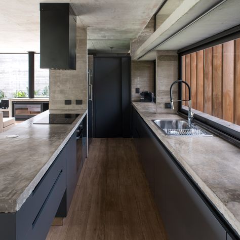 Concrete shell wraps Luciano Kruk's Rodríguez House in Argentina Industrial Kitchen Design, Concrete Houses, Concrete Home, Kitchen Remodel Ideas, Concrete Kitchen, Concrete House, Kitchen Room Design, Kitchen Furniture Design, Luxury Kitchen