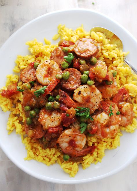 A mix of tomatoes, broth, and vegetables tossed with sautéed shrimp sausage and yellow rice all made in less than 30 minutes. This Shrimp and Sausage Spanish Rice is a flavorful family favorite. Rice With Shrimp And Sausage, Rice With Shrimp, Rice Shrimp, Suburban Kitchen, Sauteed Chicken Breast, Shrimp And Sausage, Mayo Salad, Shrimp Sausage, Salad Avocado