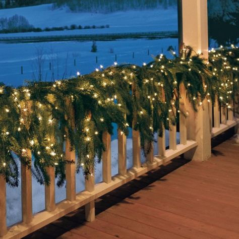 # Christmas Greenery   I wish I had a big wrap around porch! Porch Christmas Lights, Best Outdoor Christmas Decorations, Outdoor Garland, Decorative Wreaths, Christmas Lights Outside, Outside Christmas Decorations, Railings Outdoor, Porch Railing, Christmas Front Porch