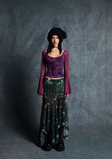 Cast a spell this fall season with this top that has a flocked floral burnout design, sheer mesh long flared sleeves, a scoop neckline with front tie closures,and a cropped fit. Long Sleeve Fits Aesthetic, Jewel Toned Outfits Summer, Styling Floral Tops, Sheer Tie Front Top Outfit, Vampy Fall Outfits, Nyx Inspired Outfits, Purple Whimsigoth Outfit, Purple And Green Fashion, Ahs Violet Outfits