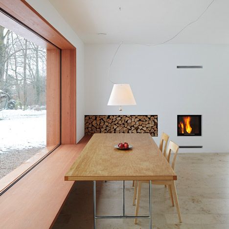 House 11x11 by Titus Bernhard Architekten Seat Window, Wooden Cladding, Wooden Window Frames, Compact House, Large Window, Window Seat, A Fire, Window Sill, Contemporary House