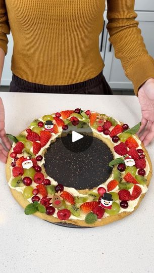 1.2M views · 10K reactions | Easy holiday dessert | Easy holiday dessert I make a sugar cookie wreath. | By Rick's Friend Justine | Facebook Fruit Pizza Wreath, Simple Desserts For A Crowd, Christmas Fruit Pizza, Sugar Cookie Wreath, Pillsbury Holiday Cookies, Vanilla Jello, Justine Kameron, Cookie Wreath, Easy Holiday Dessert