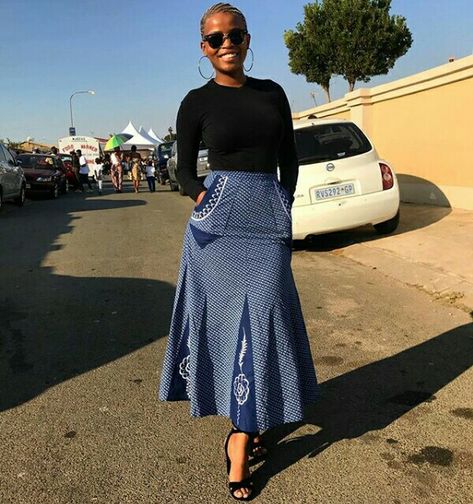 Tswana Lady In Beautiful A-line Shweshwe Skirt With Pockets and Black Top – Clipkulture Setswana Traditional Dresses, Sotho Traditional Dresses, Sesotho Traditional Dresses, Shirt With Skirt, Skirt Traditional, South African Traditional Dresses, Skirts Ideas, African Weddings, African Traditional Wear